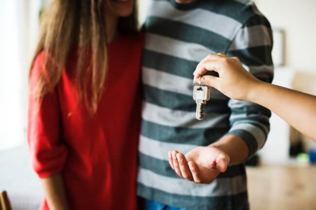 Couple receiving house keys