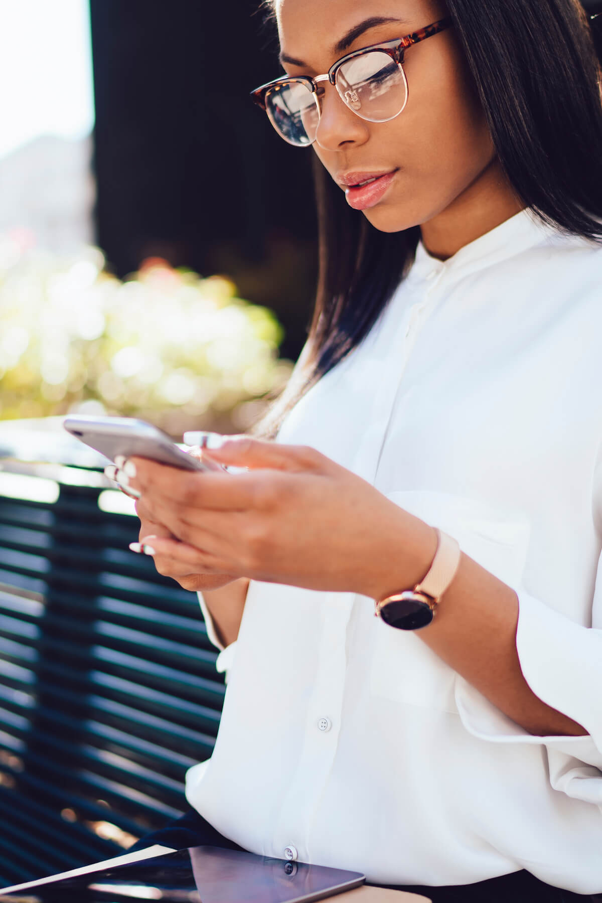 Woman looking at the HICAPS Go app