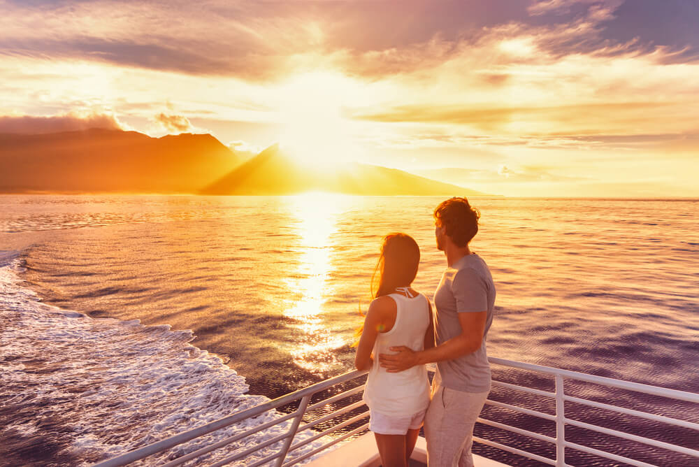 Couple on a ship, covered travel insurance for cruises