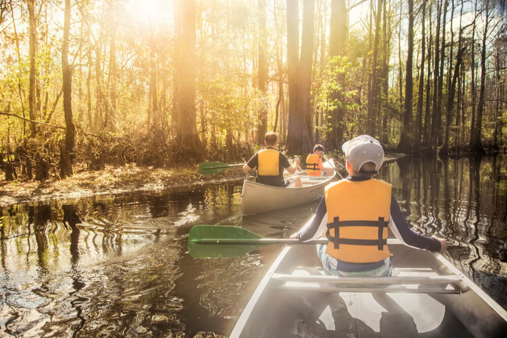 family canoeing on holiday