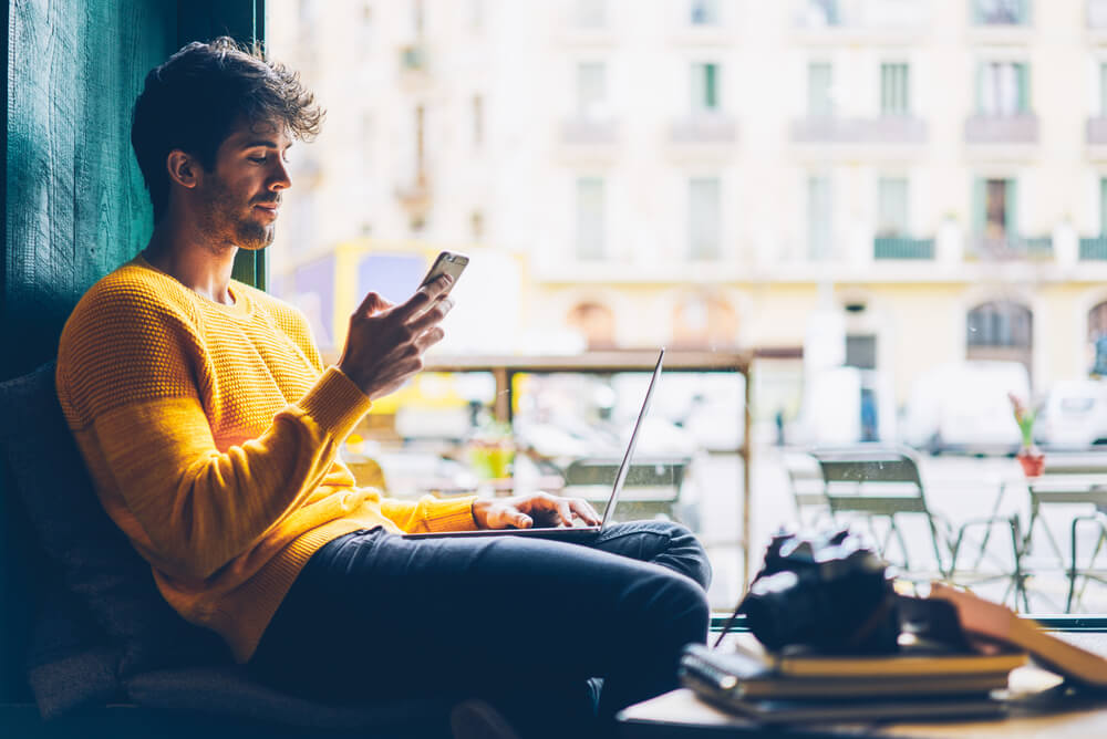 young man switching energy providers online