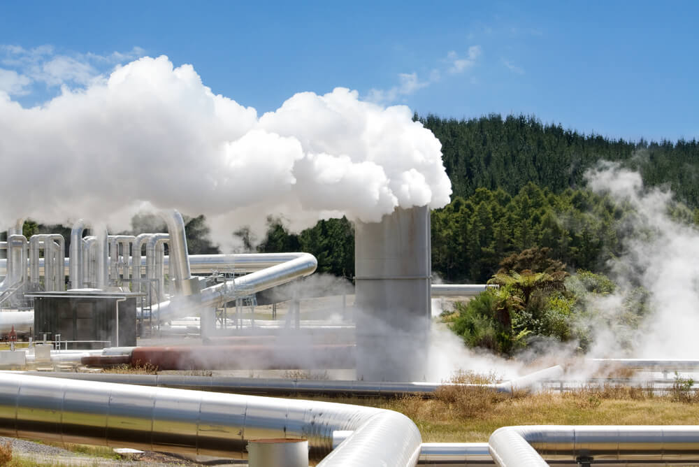 steam rising from a vent at a geothermal power plant