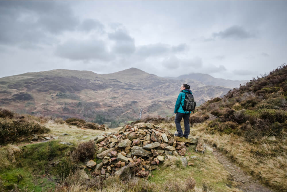woman hiking through Wales